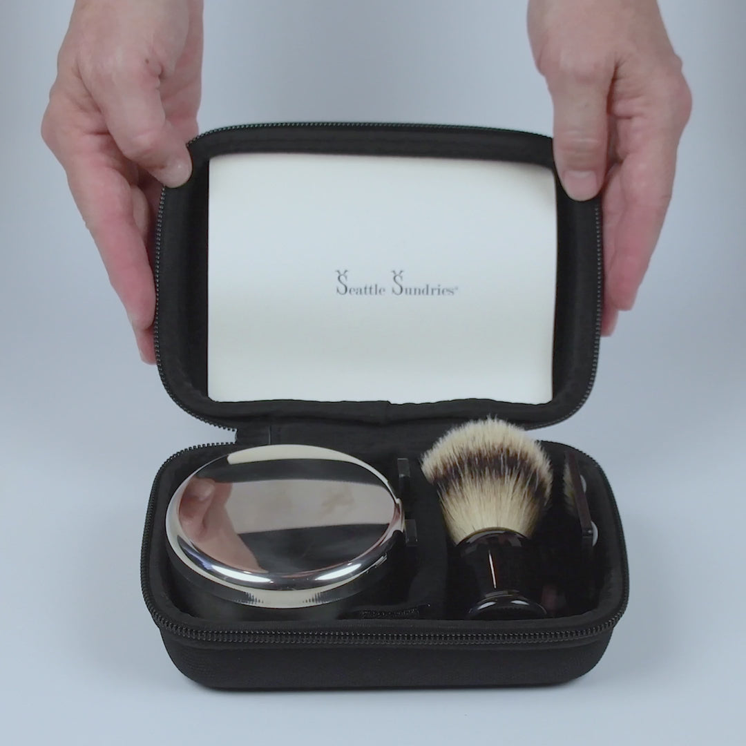 A grooming set featuring a badger shaving brush and shaving essentials, all neatly organized in a compact case.